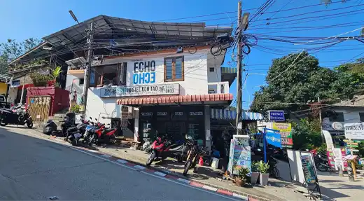 Echo Divers Koh Tao Echo Hostel Koh Tao exterior building and entrance on the main road in Sairee, Koh Tao, Thailand