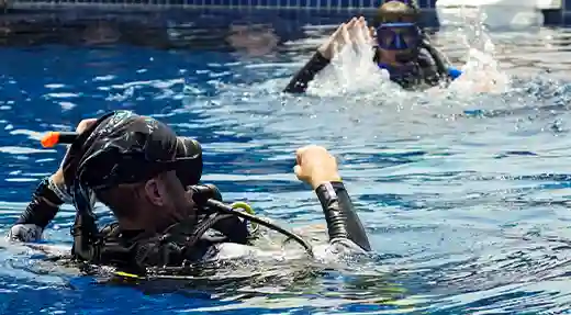 Echo Divers Koh Tao SSI Diver Stress & Rescue students practising surface skills in a pool with an instructor, Koh Tao, Thailand